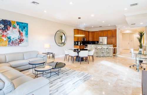 Coral Ridge House | Exquisite home with jetted bathtub, balconies, enclosed yard & elevator