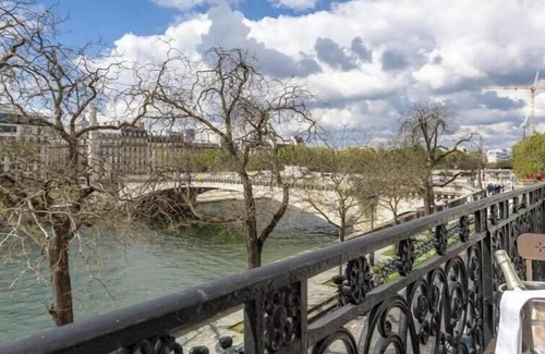 4th Arrondissement Apartment | Exquisite Marais Abode with Stunning River Viewsn