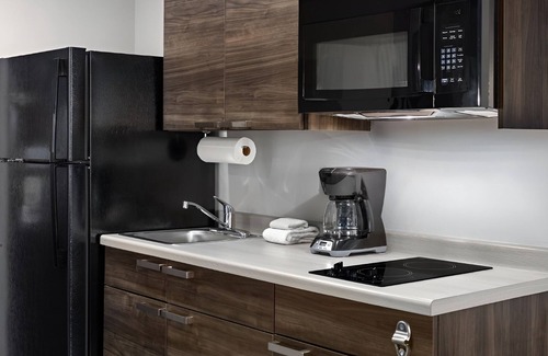 Westgate Hotel | Extended Stay Comfort in Room with Full Kitchen Near Zing Zumm Children's Museum