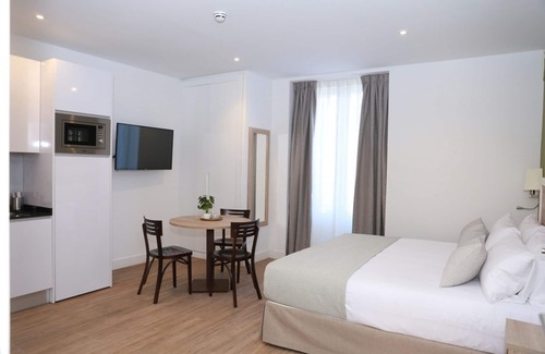 Sol Apartment | Exterior studio with a balcony for 2 people