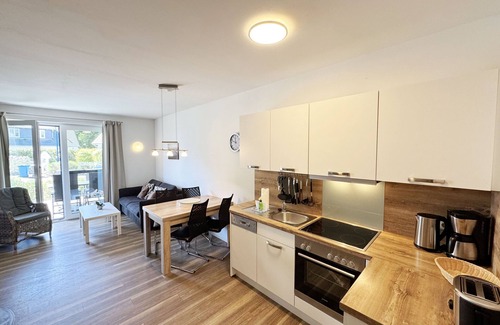 Thiessow Apartment | F: Haus Düne Whg. 03 with fireplace & south/west terrace & balcony - Haus Düne Whg. 03