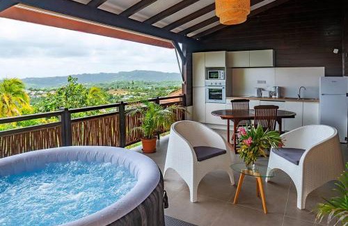Tartane Apartment | F2 Ixora - spa - piscine - vue mer - 9 min de la plage - Ti Zwézo Paradi