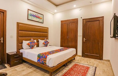 Saket Hotel | FabHotel Grand Anutham