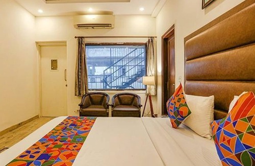 Saket Hotel | FabHotel Grand Anutham