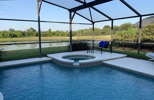 Orange Tree Villa | Fabulous lake view 5 bed Villa south facing pool/spa 15 min from Disney & Wifi