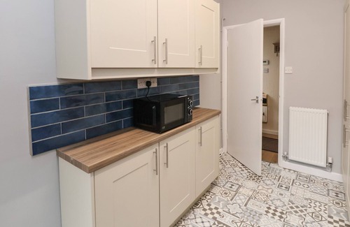 Meliden House | FAIRWAYS, pet friendly, with a garden in Prestatyn