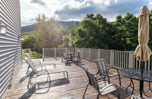 Lincoln Condo | Fall Foliage Prime Location for leaf-peeping! The iconic Kancamagus Highway is a few minutes away. South Peak view Condo w/Indoor and Outdoor Pool, Hot Tub and Deck. Walk to the swimming hole!