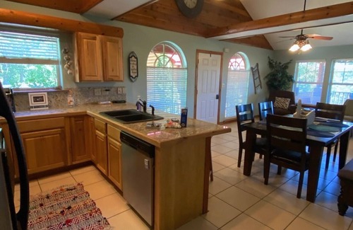 Eucha Cabin | Fall lake days! Popular Grand Lake Dripping Springs cliffside lake view cabin