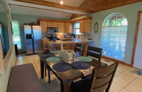 Eucha Cabin | Fall lake days! Popular Grand Lake Dripping Springs cliffside lake view cabin