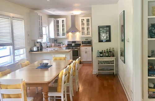 Union Pier Cottage | Fall splendor steps to the beach. Large screened porch,fire pit beautiful yard.