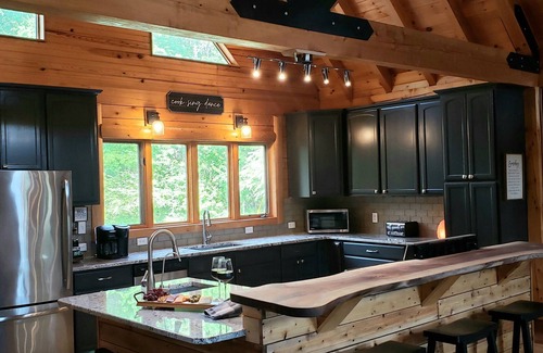 Bunnlevel Cabin | Families reconnect at Private Lakefront Log Cabin w/Hot Tub, Kayaks, Fishing!