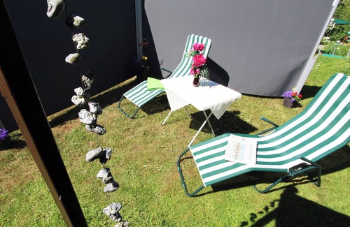 Kroepelin Apartment | Family apartment with terrace, garden and extensive furnishings in Kröpelin