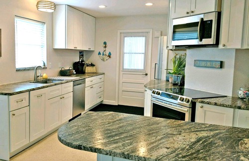 Laurel House | Family beach home! Renovated waterfront home with pool, dock, and nearby beach