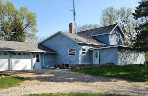 Faribault County House | Family cottage nestled along the woods & river