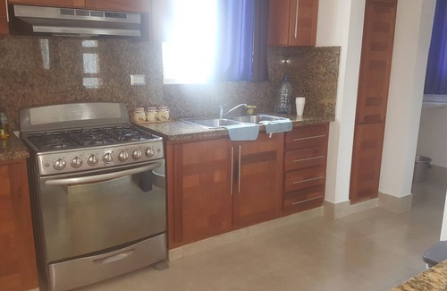 La Esplanada Apartment | Family-friendly 3BD central Sosua condo wih large pool, WIFI, BBQ, A/C, Cable TV