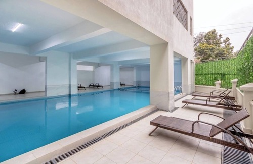 Thompson Estate Apartment | Family Friendly and Cozy Kilimani apartment with heated pool and kids play area.
