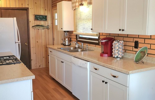 Sister Lakes Cottage | Family Friendly Lakefront Whimsical Cottage with Beach in Sister Lakes, Michigan