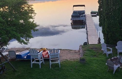 Sister Lakes Cottage | Family Friendly Lakefront Whimsical Cottage with Beach in Sister Lakes, Michigan