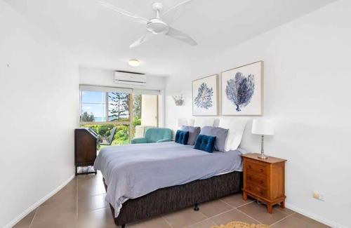 Moreton Bay Region Apartment | Family-friendly, oceanfront apartment with salt-water pool and private garden!