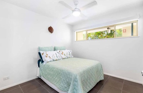 Moreton Bay Region Apartment | Family-friendly, oceanfront apartment with salt-water pool and private garden!
