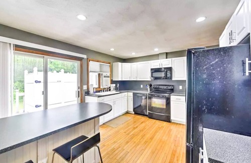 Narragansett Apartment | Family friendly yard, with deck and gas BBQ. The perfect place to relax and enjoy Narragansett!