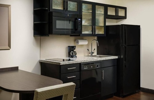 Florida Central Atlantic Coast Apartment | Family Fun in Orlando: Suite Accommodations with Pool & Shuttle!