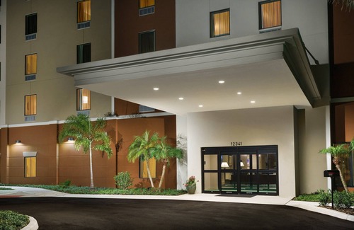 Florida Central Atlantic Coast Apartment | Family Fun in Orlando: Suite Accommodations with Pool & Shuttle!