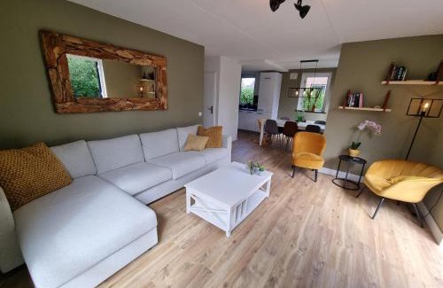 Ewijk House | Family home, large garden, playground kids, firepit, terraces, sleeps max 7 and 1 babycot, kids playroom inside