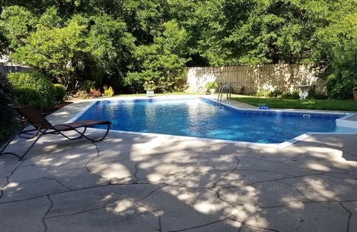 Northeast Pensacola House | Family home , Large salt water pool, not heated, and tropical courtyard