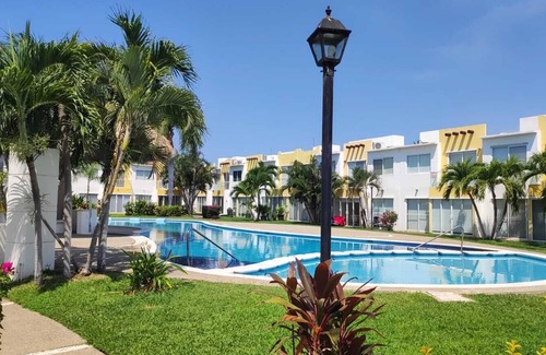 Diamante House | Family house, close to the beach, stores and the airport.