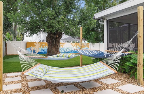 Seminole House | Family Retreat w/Heated Pool, 20+ Games, Firepit, Game room, Near Beach