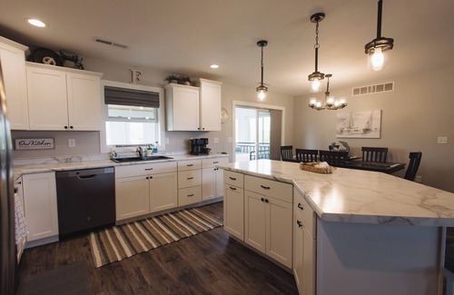 Littleport House | Family-sized house near Guttenberg. Sleeps 13. Hot tub, game room, fire pit