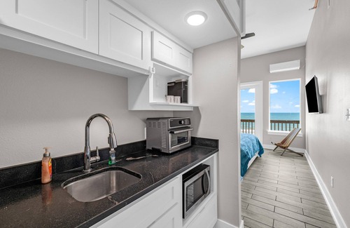 Port Bolivar Condo | Family Suite - Pool, Games, & Beachfront Fun!