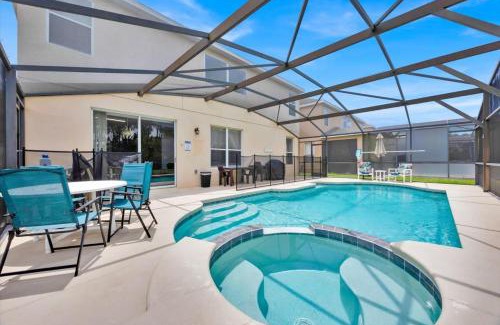 Watersong House | Family Villa with 6 Bedrooms Pool Spa and Game Room in Gated Resort