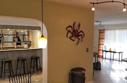 Garden Isles House | Family Waterfront Retreat – Private Pool, Hot Tub, Walk to Beach!
