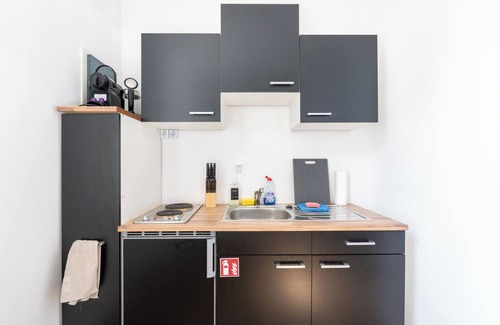 Rudolfsheim-Funfhaus Condo | Faraway Studios 43