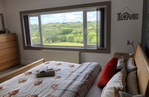 Carmarthen Bed & Breakfast | Farm setting with large living areas and wood fired hot tub
