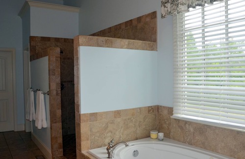 Suwanee Other | Farm Style home with a pool and game room to stretch out and have family fun.