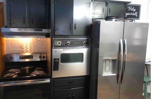 Nashville House | Farmhouse Style Nashville Stay with Hot Tub, Games, Fire Pit, Family Friendly