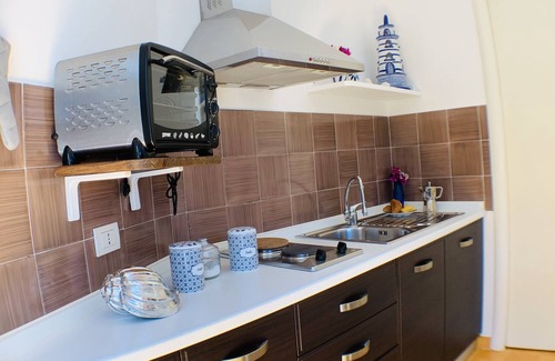 Marina del Cantone Apartment | Felicia's corner studio apartment 2 steps from the sea