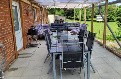 Blekendorf House | Ferienhaus Kastanie mit Whirlpool Kamin und Sauna