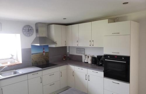 Blekendorf House | Ferienhaus Kastanie mit Whirlpool Kamin und Sauna