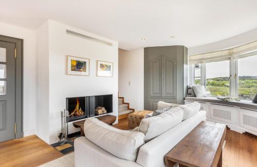 Rantum House | Ferienhaus Seehaus Sylt - Urlaubszauber in den Dünen mit fantastischem Meerblick