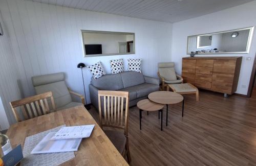 Schausende Apartment | Ferienwohnung Am Leuchtturm