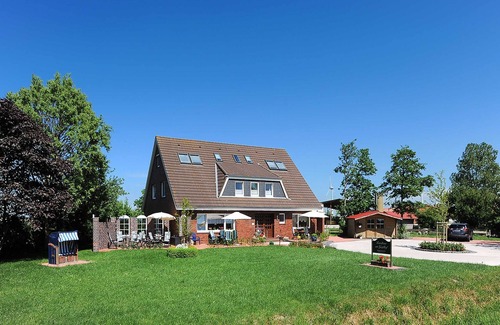 Neuharlingersiel Apartment | Ferienwohnung Wiesenblick im Landhaus am Grafthof - Ferienwohnung Wiesenblick