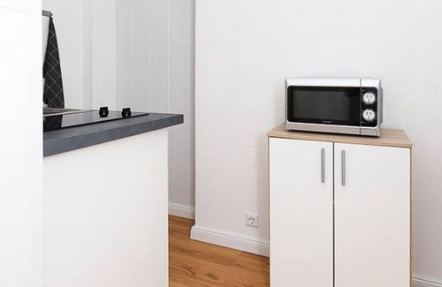 Neuharlingersiel Apartment | Ferienwohnung Dünenrose - Ferienwohnungen im Haus Waterkant in Neuharlingersiel