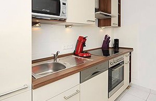 Neuharlingersiel Apartment | Ferienwohnung Antaris - Haus Hafenromantik in Neuharlingersiel