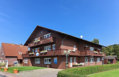 Neuharlingersiel Apartment | Ferienwohnung Antaris - Haus Hafenromantik in Neuharlingersiel