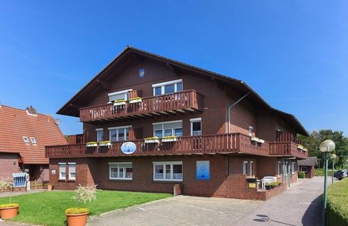 Neuharlingersiel Apartment | Ferienwohnung Antaris - Haus Hafenromantik in Neuharlingersiel