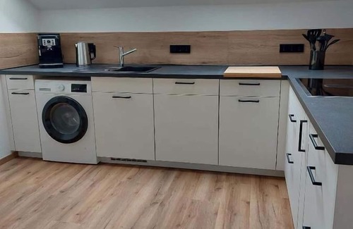 Langdorf Apartment | Ferienwohnung Gartenblick mit Südbalkon